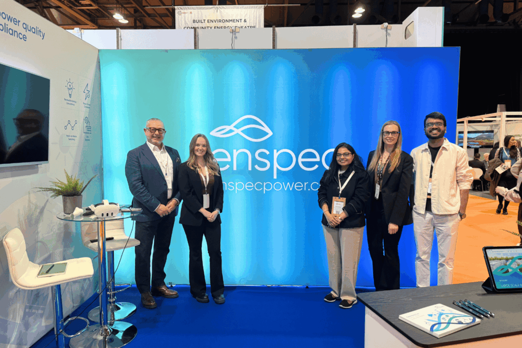 the enspec team standing in front of the stand at all energy 2026